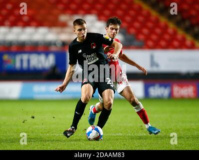 WOOLWICH, United Kingdom, NOVEMBER 10:L-R Hector Kyprianou of Leyton Orient under pressure from Charlton Athletic's Hady Ghandour  during Papa John's Stock Photo