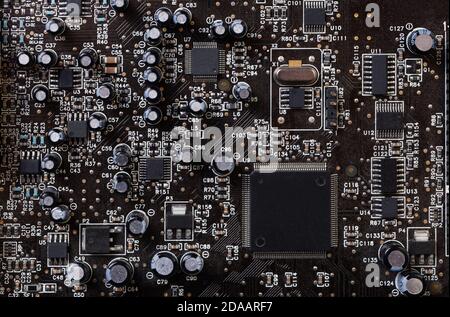 Closeup computers circuit board with various electronic components Stock Photo