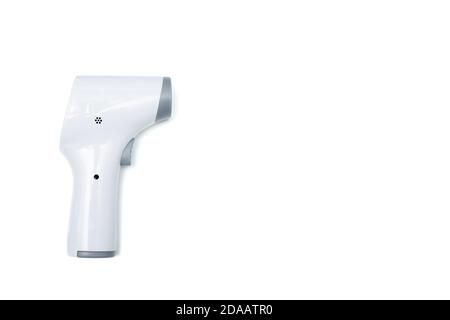 Temperature gun isolated on white background. Close up of laser thermometer with copy space for text. Stock Photo