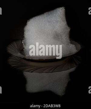 White dishwashing foam on the plate with reflection isolated on black background. Template for adding to your photos - just add it in lighten blending Stock Photo