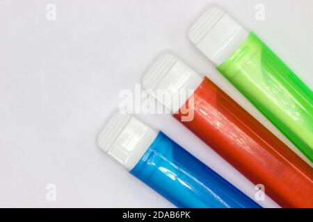 Colourful travel toothbrushes on a white background Stock Photo
