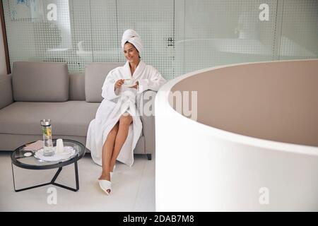 Table with the treat for the client holding beverage Stock Photo
