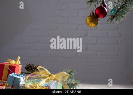 Image of luxury New Year gifts, different present boxes under Christmas tree in holiday eve, Christmastime celebration, home decorated with festive sh Stock Photo