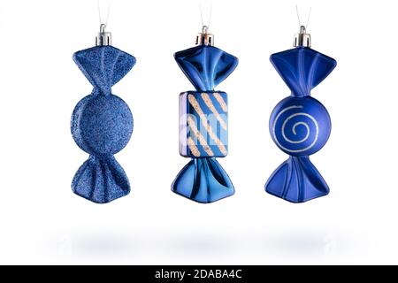 Christmas and new year toys isolate-blue candies on a white background Stock Photo