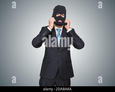 Criminal Businessman With Balaclava In Office Stock Photo - Alamy