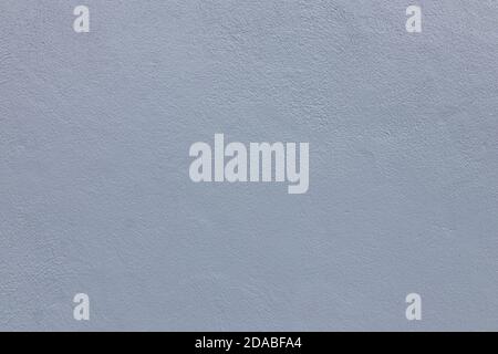 Beautiful gray painted wall. Empty gray cement wall background and texture. Beautiful grey Advertising Backdrop. Stock Photo