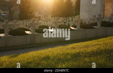 View of crosses grave stones on graves at sunset in lviv city in Ukraine Stock Photo