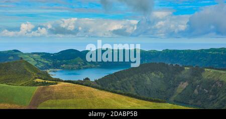 Sete Cidades on Sao Miguel is a small town in a volcanic crater with a big crater lake Stock Photo