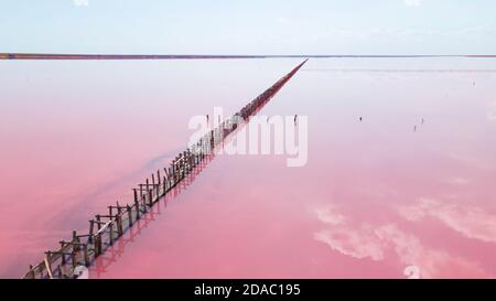 Aerial view of wooden structures for collecting salt on a pink lake, Genichesk, Ukraine. Stock Photo