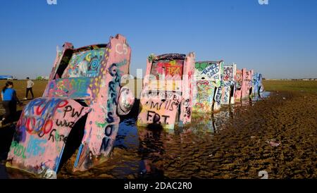 Cadillac Ranch is a public art installation and sculpture in Amarillo, Texas. It was created in 1974 by Chip Lord, Hudson Marquez and Doug Michels. Stock Photo