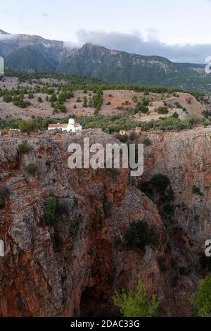 Church of Archangel Michael perched on the edge of Aradena Gorge, Hora Sfakion, Crete Stock Photo