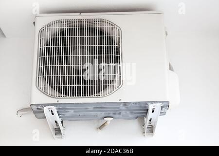 Split air conditioning system with external unit mounted in walls Stock Photo