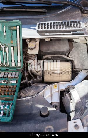 Dirt used cartridge of air filter, maintenance item, close-up view Stock Photo