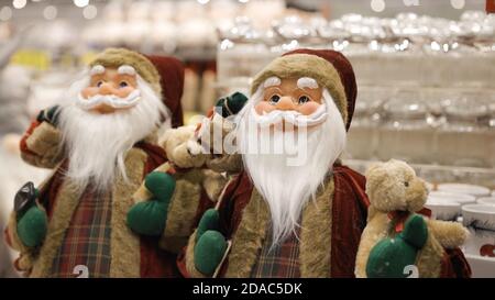 Santa Claus decoration toys close view displayed in shop Stock Photo