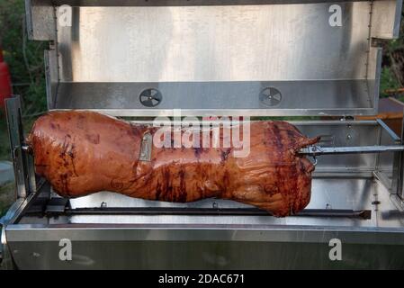 Pork being cooked on a barbecue Stock Photo