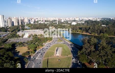 Aerial view of Ibirapuera park in Sao Paulo city and obelisk monument. Prevervetion area with trees and green area of Ibirapuera park. Stock Photo
