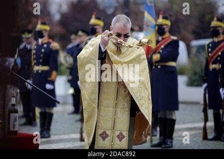 Bucharest, Romania - November 11, 2020: Romanian army priest (christian orthodox) is holding service during a public ceremony. Stock Photo