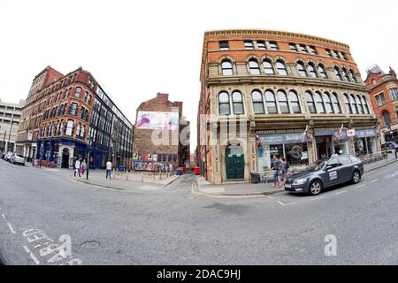 High Street, in Manchester's Bohemian Northern Quarter. Looking towards the alleyways of Soap Street and Back Turner Street, close to the city centre. Stock Photo