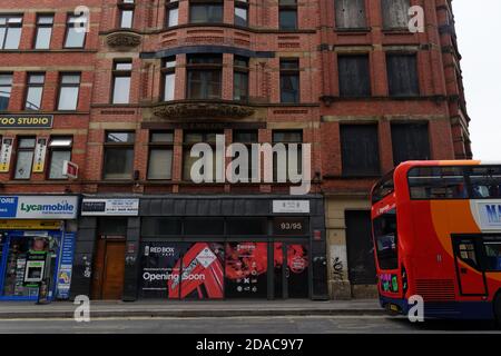 The former Umbrella Factory on Shudehill. a road in the former Smithfield Market area of Manchester. Now home to a tattoo studio, shops and flats. Stock Photo