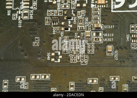 various chips on a textolite video card board for a modern desktop computer Stock Photo