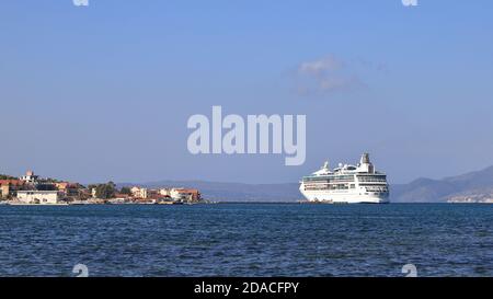 Royal Caribbean cruise ship, Rhapsody of the Seas, moored in Argostoli, on the Greek island of Kefalonia.  The cruise ship entered service in 2000. Stock Photo