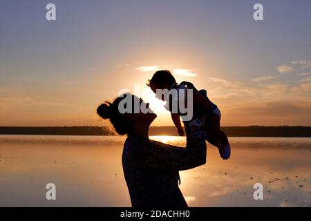 Woman with a child silhouette Stock Photo