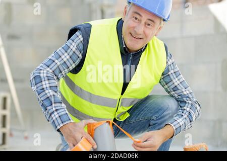 a smiling mature master outdoors Stock Photo