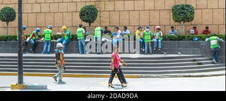 Construction workers break for lunch in Mexico City, Mexico Stock Photo