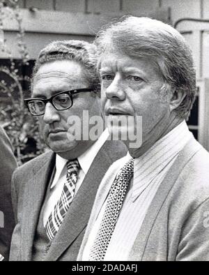 United States Secretary of State Henry A. Kissinger, left, with US President-elect Jimmy Carter, left, as they meet in Plains, Georgia on November 11, 1976 for foreign policy briefings ahead of their inauguration.Credit: Consolidated News Photos | usage worldwide Stock Photo