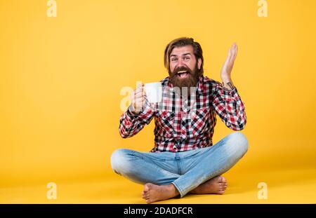 surprise. need some coffee for inspiration. perfect start of the day. happy bearded man drinking morning coffee. man drink hot tea from cup. good morning to you. energetic warm beverage. copy space. Stock Photo