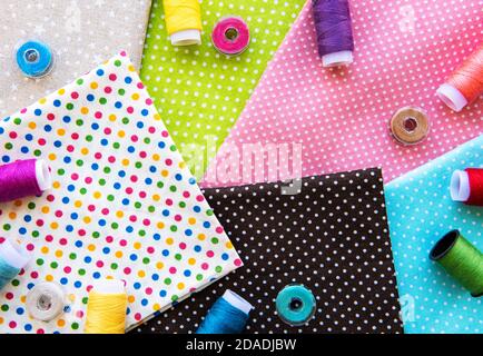 Sewing accessories and fabric. Top view, flat lay. Stock Photo