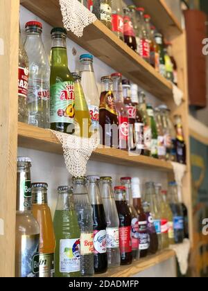 Many bottles with lemonad in the shop Stock Photo