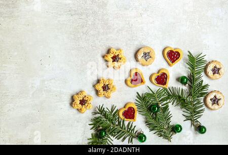 Traditional Austrian christmas cookies - Linzer biscuits filled with red berry jam Stock Photo