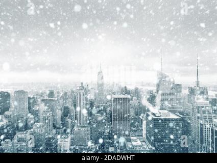 NEW YORK, USA - CIRCA 2017: Snowfall in New York City. New York City skyline during a snowstorm. Aerial view over Manhattan Stock Photo