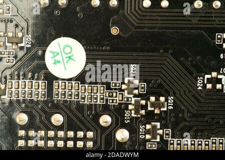various chips on a textolite video card board for a modern desktop computer Stock Photo