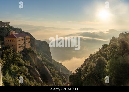 Barcelona, Spain - Feb 23, 2020: Sunrise above sea of clouds view from Montserrat in winter
