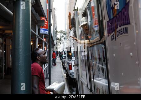 NEW YORK, USA - Sep 16, 2017: Manhattan street scene. Americans on the streets of New York City. New Yorkers and tourists walking on the streets of Ma Stock Photo