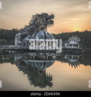 Hue, Vietnam, January 23, 2020, Dragon head in a abandoned Waterpark, Slide and swimming pool left behind, Hue, Vietnam