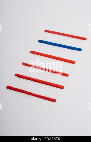 Sticks of various colors on awhite background Stock Photo