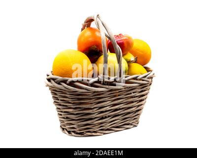Fruit basket isolated on white background Stock Photo