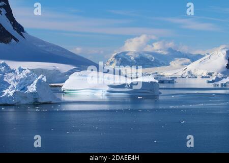 Groups of icebergs floating in the cold waters of the Antarctic peninsula, Antarctica Stock Photo
