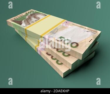 Stack of ukrainian money hryvnia on green  background Stock Photo
