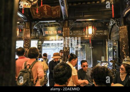 Tourists and visitors in the Old House of Tan Ky, a preserved 18th-century merchant's house, Hoi An, Vietnam, Asia Stock Photo