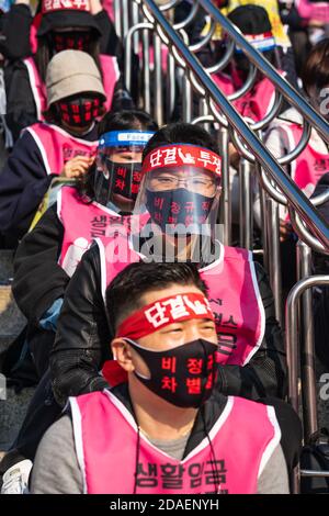 Seoul, South Korea. 12th Nov, 2020. Protesters of Korean Railway Workers' Union wearing face masks participate in a rally against KORAIL(Korea Railroad Corporation).Korean Railway Workers' Union members stage a rally against KORAIL (Korea Railroad Corporation) and the government's policy in front of Seoul Regional Employment and Labor Administration in Seoul. Credit: SOPA Images Limited/Alamy Live News Stock Photo