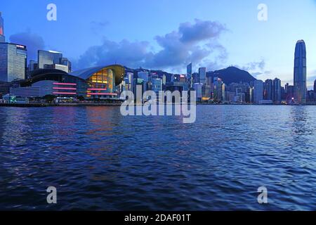 HONG KONG -29 JUN 2019- Night view of the Victoria Harbor in Hong Kong in front of the Wan Chai convention centre. Stock Photo