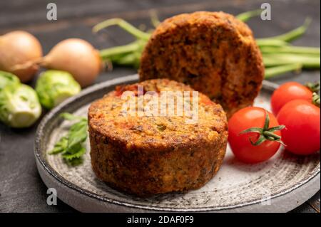 Fresh veggie burgers made from vegetables, beans and legumes, tasty vegan food close up Stock Photo
