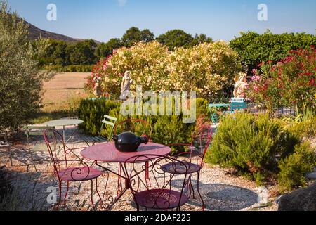 Set of table and two blue chairs in the garden with amazing mountain view. Provence France. Stock Photo