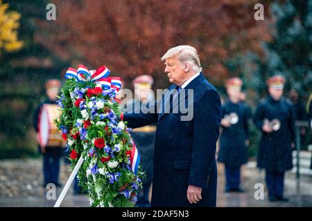 Arlington, United States Of America. 11th Nov, 2020. Arlington, United States of America. 11 November, 2020. U.S President Donald Trump places a wreath during a Wreath-Laying Ceremony at the Tomb of the Unknown Soldier at Arlington National Cemetery November 11, 2020 in Arlington, Virginia. The annual ceremony is in honor of Veterans Day Observance. Credit: Elizabeth Fraser/U.S. Army Photo/Alamy Live News Stock Photo