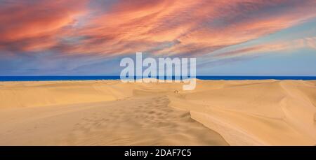 Sand Dunes in Gran Canaria with beautiful coast and beach at Maspalomas, Canarian Islands, Spain Stock Photo