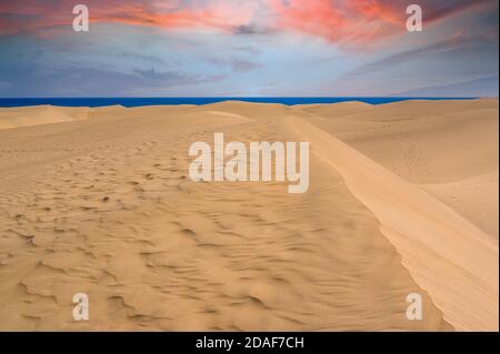 Sand Dunes in Gran Canaria with beautiful coast and beach at Maspalomas, Canarian Islands, Spain Stock Photo